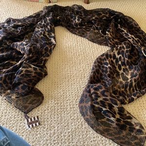 Never Worn. Has Tags.Beautifully sized silk chiffon leopard printed scarf.